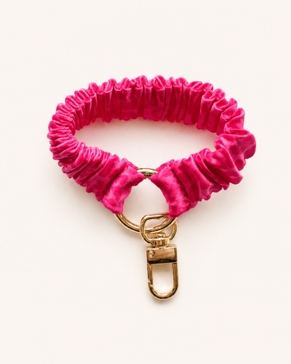 Llavero colet seda animal print rosado